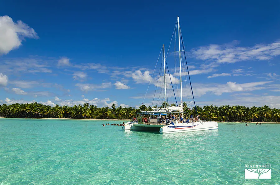 White catamaran on azure water against blue sky mauritius-escursioni
